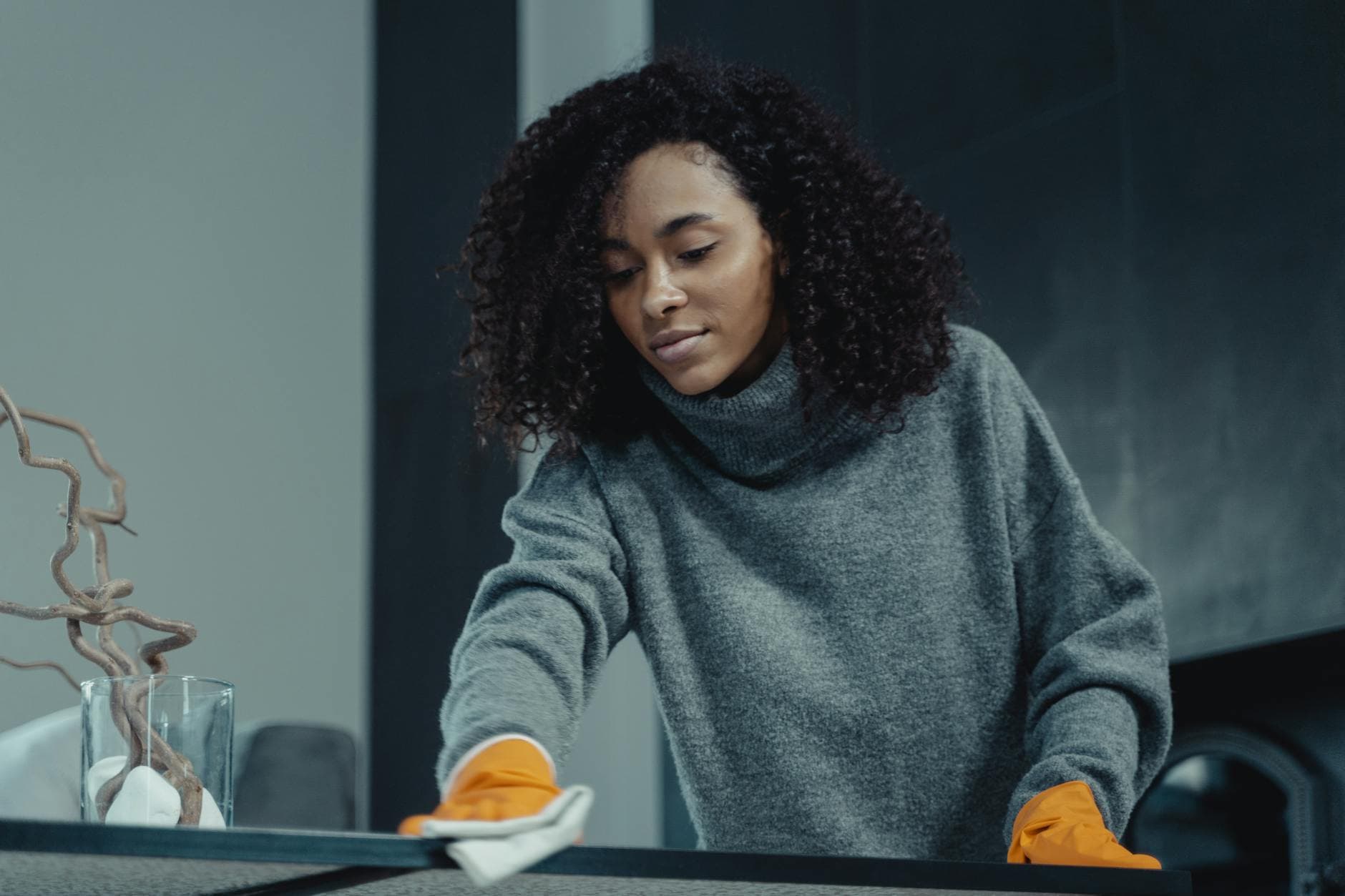 The NYC Maid cleaner wiping a table in a New York City apartment — The NYC Maid