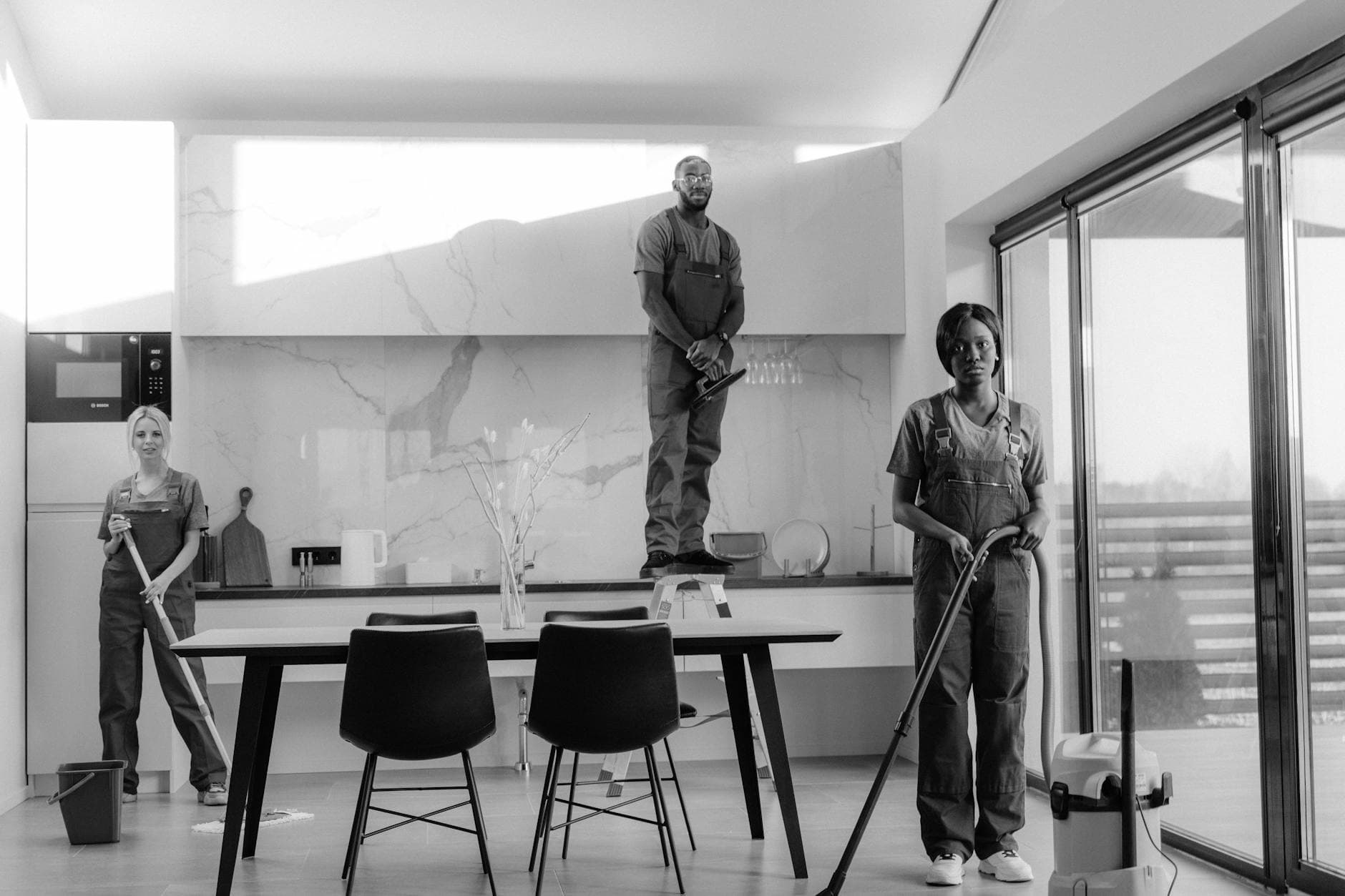 Professional NYC Maid team working in a modern dining room in New York City — Office Cleaning in Hell's Kitchen, Manhattan